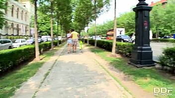 Blonde tourist chick picks up a banana, eats it, then gets picked up for deep anal riding barefoot