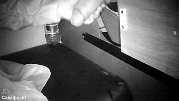 I went to the glory hole and hooked up with a guy with a thick cock inside the cabin