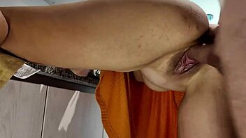 curvy woman with shaved pussy gets drilled doggystyle in the kitchen by hung stud