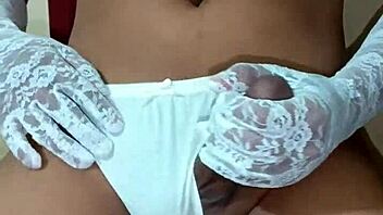 Ladyboy shemale wearing erotic white panty and bra.