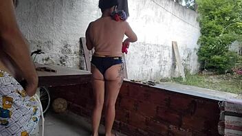 Maid seduces with tight shorts until getting action on the home balcony