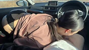 In a teasing outdoor encounter, the brunette student fucked her friend in the car