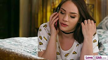 Two women engage in scissoring tribbing big tits licking natural tits kissing and muff diving in lesbian session.