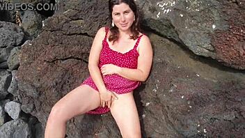 Young curvy milf flashes big tits and hairy pussy on public beach for dirty talk seduction