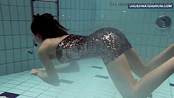 Flashing bright tits underwater in bikini makes everyone feel the thrill