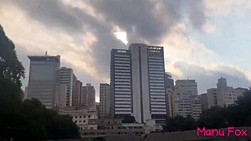 hey, check out this brazilian brunette flashing her big ass and tits naked in the street!