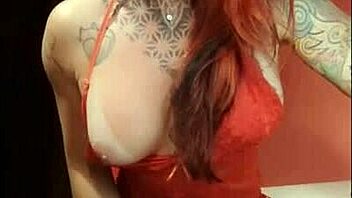 Redhead beauty teases on web with full sensuality in shower