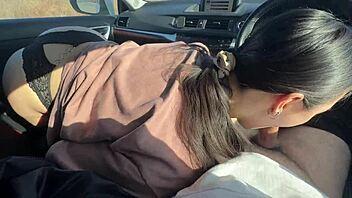 In a teasing outdoor encounter, the brunette student fucked her friend in the car