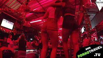 asian bar girl shows off her dancing moves