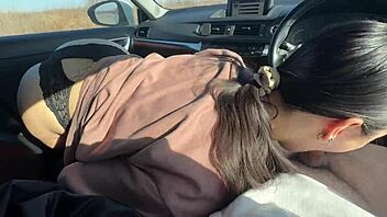 In a teasing outdoor encounter, the brunette student fucked her friend in the car