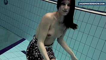 Flashing bright tits underwater in bikini makes everyone feel the thrill