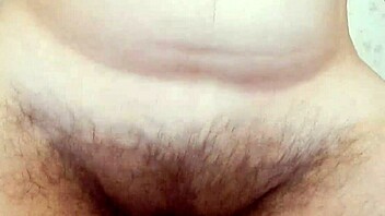 hairy mature riding with chubby ass and legs spread in sex session. details show beaver pussy and mature milf action.