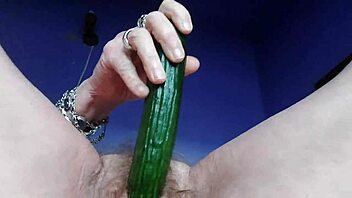 Bold granny shoves cucumber into hairy beaver for intense pleasure