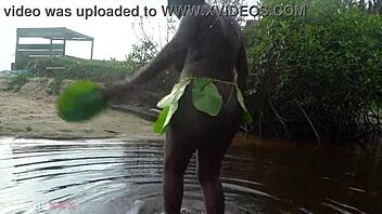 busty african witch grinds her thick body with big nipples in ritual dance and cleanses in sacred water outdoors