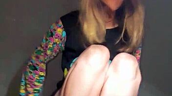 Bonneyuwu enjoys a playful session with pajamas, toys, and a stuffed animal in bed.