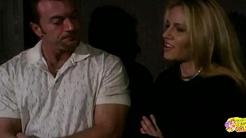 The office turns steamy as lesbian hotties use a strapon for threesome pussy licking and orgasms.