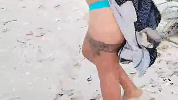 Hey, are you watching me flash my tits and ass on this Mexican beach? Want to join the fun?