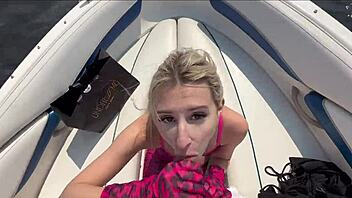attractive blonde in lingerie enjoys time with captain on boat