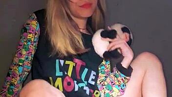 Bonneyuwu enjoys a playful session with pajamas, toys, and a stuffed animal in bed.