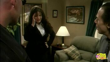 The office turns steamy as lesbian hotties use a strapon for threesome pussy licking and orgasms.