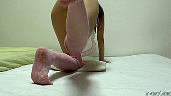 Hey, check this Japanese girl spreading legs in pink stockings! 😍