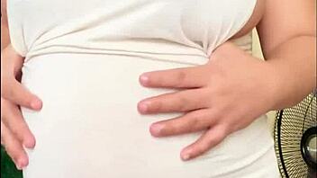 pregnant arab girl shows off her big belly and milky boobs!