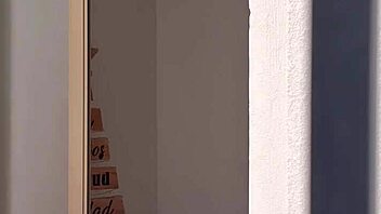 I secretly watch my attractive roommate as she undresses, uses the bathroom, and showers in private moments.