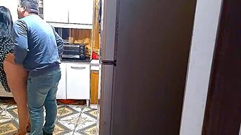 Uh, in the kitchen of sin, the wife gets wild with her lover... so intense!