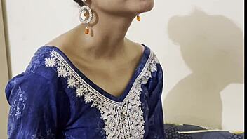 Indian woman and young guy share hotel bed in clear conversation during their encounter.