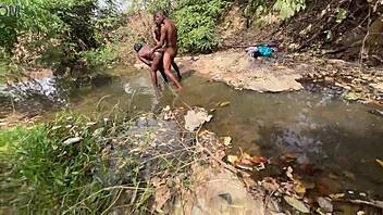 curvy brown skinned ebony flashes at the stream ready to be devoured outdoors