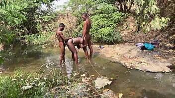 curvy brown skinned ebony flashes at the stream ready to be devoured outdoors