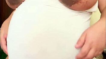 pregnant arab girl shows off her big belly and milky boobs!