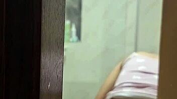 I secretly watch my attractive roommate as she undresses, uses the bathroom, and showers in private moments.