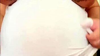 pregnant arab girl shows off her big belly and milky boobs!