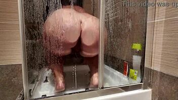 Big breasted milf shaves hairy pussy in shower showing big tits and ass