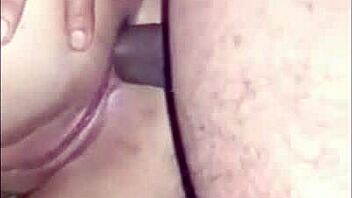 Amateur footage shows a curvy Latina engaging in intimate backdoor play on camera.