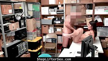 Loss prevention officer applies procedure to the caught shoplifter in the office