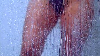 College tanned girl showers in bikini!