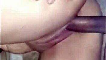 Amateur footage shows a curvy Latina engaging in intimate backdoor play on camera.