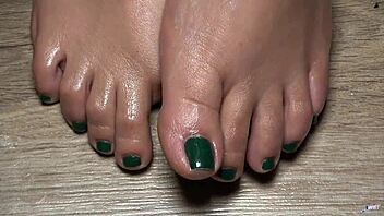 Hey, wanna get up close with my green-nailed toes for your ultimate foot fetish fantasy?