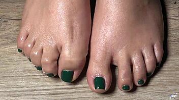 Hey, wanna get up close with my green-nailed toes for your ultimate foot fetish fantasy?