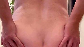 Taylor11951 trained with a cone dildo, leading to noticeable anal gaping in this retro solo session.