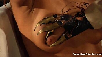 Hey, check out this curvy handstied lesbian slave moaning and orgasming under dom madame's control