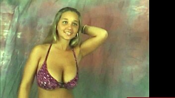 Busty Brunette Christina Dances Seductively In Purple Bikini