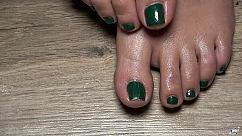 Hey, wanna get up close with my green-nailed toes for your ultimate foot fetish fantasy?