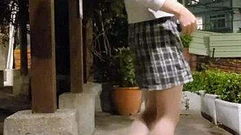 Shemale Ting Xuan outdoors peeing and masturbating in park after removing underwear