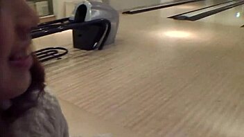 Behind the bowling alley, this young Asian babe with big clit and puffy nipples sucked cock and swallowed cum eagerly