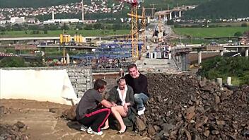 Cute Little 18+ Chick Takes Monster Cocks in Public Construction Site Orgy With Two Guys