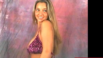 Busty Brunette Christina Dances Seductively In Purple Bikini