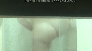 perverted guy hides camera to record sexy girl in shower real video